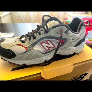 Brand new with tags, men’s New Balance tennis shoes.